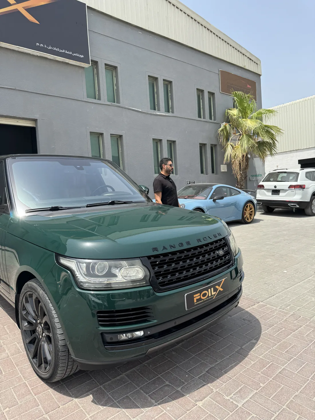 Range Rover in British racing green outside the FoilX workshop in Al Quoz 1